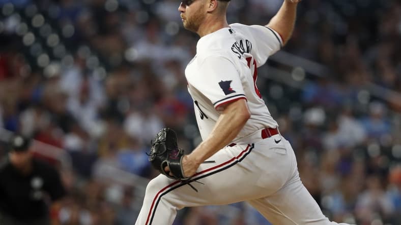 Jun 2, 2023; Minneapolis, Minnesota, USA; Minnesota Twins relief pitcher Brock Stewart (61) throws to the Cleveland Guardians in the seventh inning at Target Field. Mandatory Credit: Bruce Kluckhohn-USA TODAY Sports