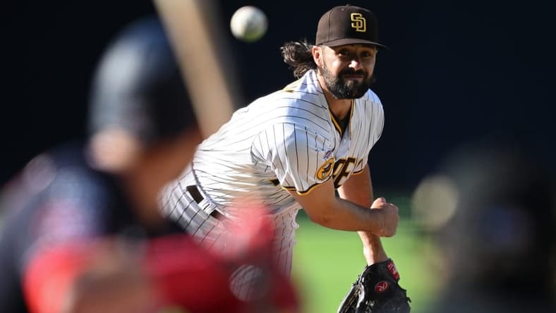 Jun 24, 2023; San Diego, California, USA; San Diego Padres starting pitcher Matt Waldron (61) throws a pitch against the Washington Nationals during the first inning at Petco Park. Mandatory Credit: Orlando Ramirez-USA TODAY Sports