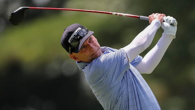 Kevin Sutherland holds his follow-through after hitting his tee shot on the 10th hole during the second round for the 2023 U.S. Senior Open on Friday, June 30, 2023, at SentryWorld in Stevens Point, Wis. Tork Mason/USA TODAY NETWORK-Wisconsin