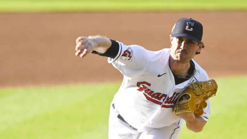 Jul 4, 2023; Cleveland, Ohio, USA; Cleveland Guardians starting pitcher Shane Bieber (57) delivers a pitch in the first inning against the Atlanta Braves at Progressive Field. Mandatory Credit: David Richard-USA TODAY Sports