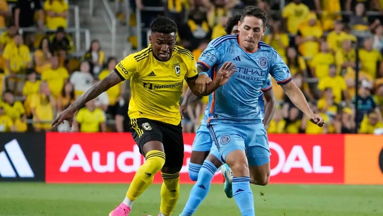 Jul 8, 2023; Columbus, Ohio, USA; Columbus Crew midfielder Luis Diaz (11) runs past New York City FC defender Braian Cufre (3) during the second half of the MLS soccer match at Lower.com Field. Diaz was brought down by Cufre on the play but no foul was called, resulting in Columbus Crew head coach Wilfried Nancy being given a red card for his protest. The Crew tied 1-1.