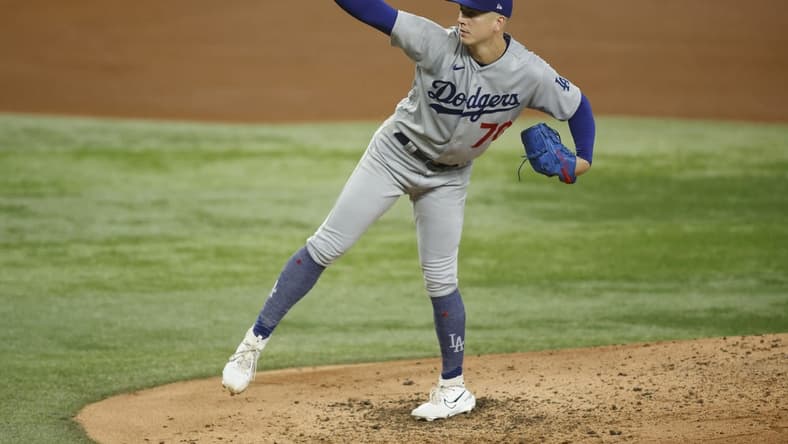 Jul 22, 2023; Arlington, Texas, USA; Los Angeles Dodgers starting pitcher Bobby Miller (70) pitches in the fourth inning against the Texas Rangers at Globe Life Field. Mandatory Credit: Tim Heitman-USA TODAY Sports