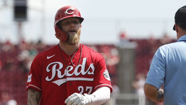 Jul 23, 2023; Cincinnati, Ohio, USA; Cincinnati Reds center fielder Jake Fraley (27) walks from third base after being tagged out against the Arizona Diamondbacks during the sixth inning at Great American Ball Park. Mandatory Credit: David Kohl-USA TODAY Sports