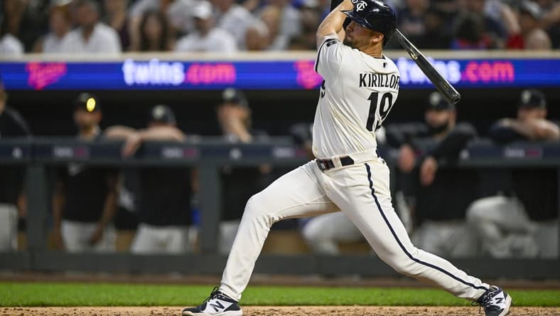 Jul 24, 2023; Minneapolis, Minnesota, USA;  Minnesota Twins infielder Alex Kirilloff (19) hits a double against the Seattle Mariners during the ninth inning at Target Field. Mandatory Credit: Nick Wosika-USA TODAY Sports