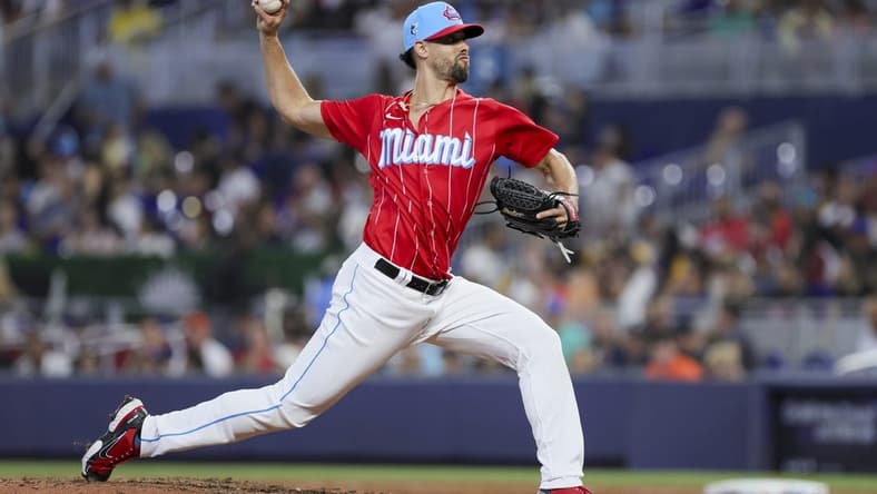 Jul 29, 2023; Miami, Florida, USA; Miami Marlins relief pitcher Jorge Lopez (52) delivers a pitch against the Detroit Tigers during the eighth inning at loanDepot Park. Mandatory Credit: Sam Navarro-USA TODAY Sports