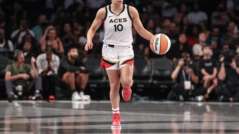 Aug 6, 2023; Brooklyn, New York, USA; Las Vegas Aces guard Kelsey Plum (10) brings the ball up court in the third quarter against the New York Liberty at Barclays Center. Mandatory Credit: Wendell Cruz-USA TODAY Sports
