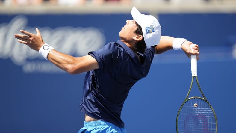Aug 11, 2023; Toronto, Ontario, Canada; Mackenzie McDonald (USA) overhands a ball to Alejandro Davidovich Fokina (not pictured) at Sobeys Stadium. Mandatory Credit: John E. Sokolowski-USA TODAY Sports