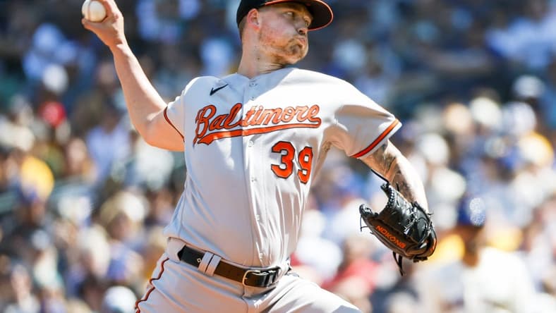 Aug 13, 2023; Seattle, Washington, USA; Baltimore Orioles starting pitcher Kyle Bradish (39) throws against the Seattle Mariners during the third inning at T-Mobile Park. Mandatory Credit: Joe Nicholson-USA TODAY Sports