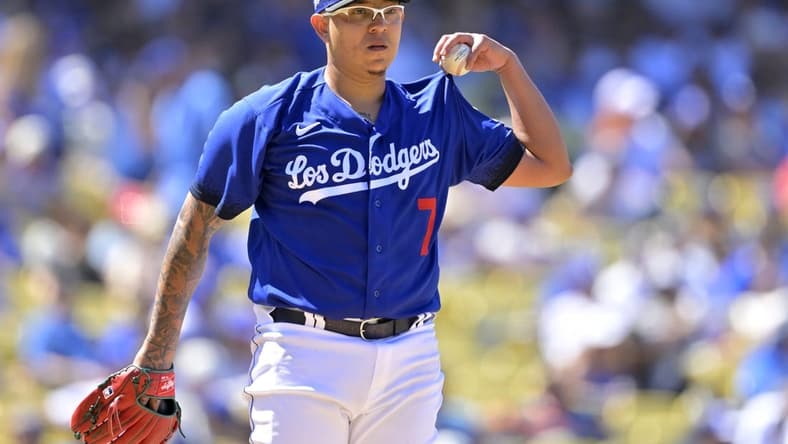 Aug 13, 2023; Los Angeles, California, USA; Los Angeles Dodgers starting pitcher Julio Urias (7) on the mound in the seventh inning against the Colorado Rockies at Dodger Stadium. Mandatory Credit: Jayne Kamin-Oncea-USA TODAY Sports