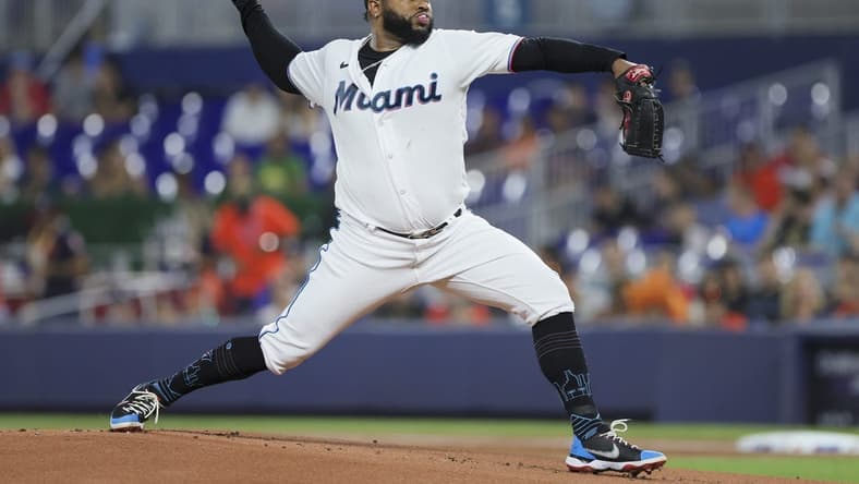 Aug 15, 2023; Miami, Florida, USA;  Miami Marlins starting pitcher Johnny Cueto (47) delivers a pitch against the Houston Astros during the first inning at loanDepot Park. Mandatory Credit: Sam Navarro-USA TODAY Sports