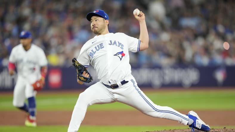 Aug 15, 2023; Toronto, Ontario, CAN; Toronto Blue Jays starting pitcher Yusei Kikuchi (16) pitches to the Philadelphia Phillies during the second inning at Rogers Centre. Mandatory Credit: John E. Sokolowski-USA TODAY Sports
