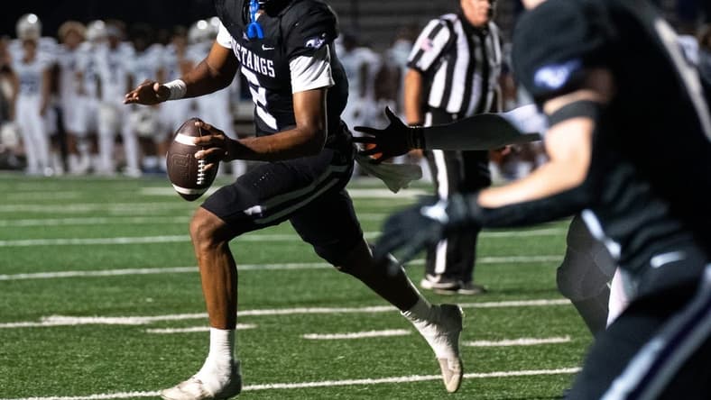 Lipscomb's Deuce Knight (2) looks upfield against IMG at Lipscomb's Reese Smith Football Field in Nashville, Tenn., Friday night, Aug. 18, 2023. IMG went on to win the game 35-10.