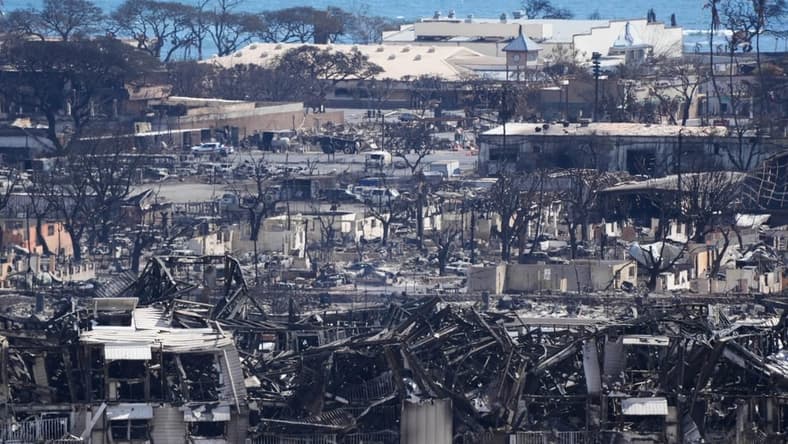 Aug. 12, 2023 : Burned houses and buildings are seen in Lahaina. Thousands were displaced after a wildfire fueled by winds from Hurricane Dora and dry vegetation destroyed much of the town. The death toll from the fire makes it the deadliest wildfire of the past U.S.