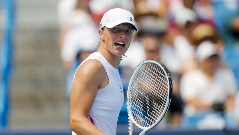 Aug 19, 2023; Mason, OH, USA; Iga Swiatek (POL) reacts after a point against Coco Gauff (USA) during the Western and Southern Open tennis tournament at Lindner Family Tennis Center. Mandatory Credit: Katie Stratman-USA TODAY Sports