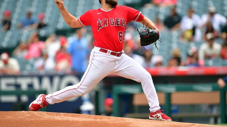 Aug 19, 2023; Anaheim, California, USA; Los Angeles Angels starting pitcher Chase Silseth (63) throws against the Tampa Bay Rays during the first inning at Angel Stadium. Mandatory Credit: Gary A. Vasquez-USA TODAY Sports