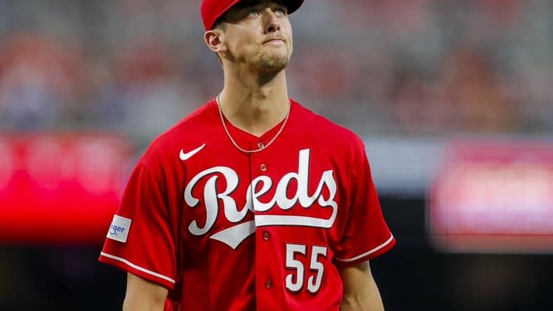 Aug 19, 2023; Cincinnati, Ohio, USA; Cincinnati Reds starting pitcher Brandon Williamson (55) walks off the field during a pitching change in the sixth inning against the Toronto Blue Jays at Great American Ball Park. Mandatory Credit: Katie Stratman-USA TODAY Sports