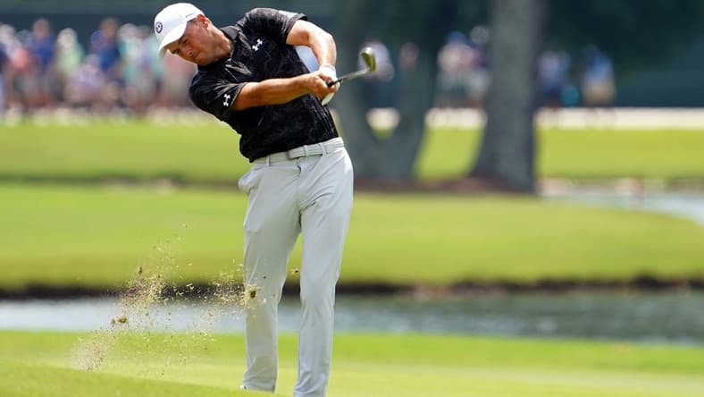 Jordan Spieth plays his shot on the on the eighth hole during the second round of the TOUR Championship golf tournament at East Lake Golf Club. Mandatory Credit: John David Mercer-USA TODAY Sports
