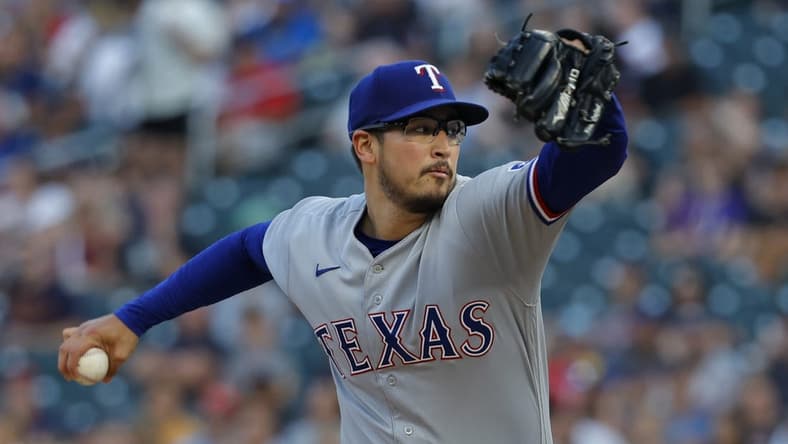 Aug 25, 2023; Minneapolis, Minnesota, USA; Texas Rangers starting pitcher Dane Dunning (33) throws to the Minnesota Twins in the first inning at Target Field. Mandatory Credit: Bruce Kluckhohn-USA TODAY Sports