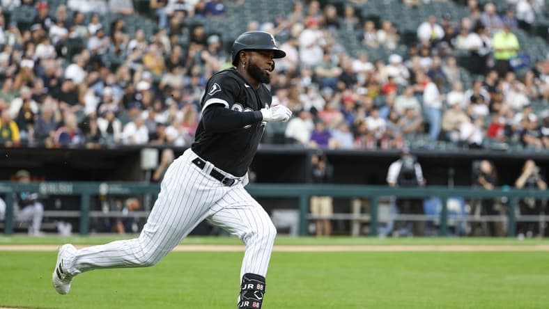 Aug 26, 2023; Chicago, Illinois, USA; Chicago White Sox center fielder Luis Robert Jr. (88) runs to second base after hitting a double against the Oakland Athletics during the first inning at Guaranteed Rate Field. Mandatory Credit: Kamil Krzaczynski-USA TODAY Sports