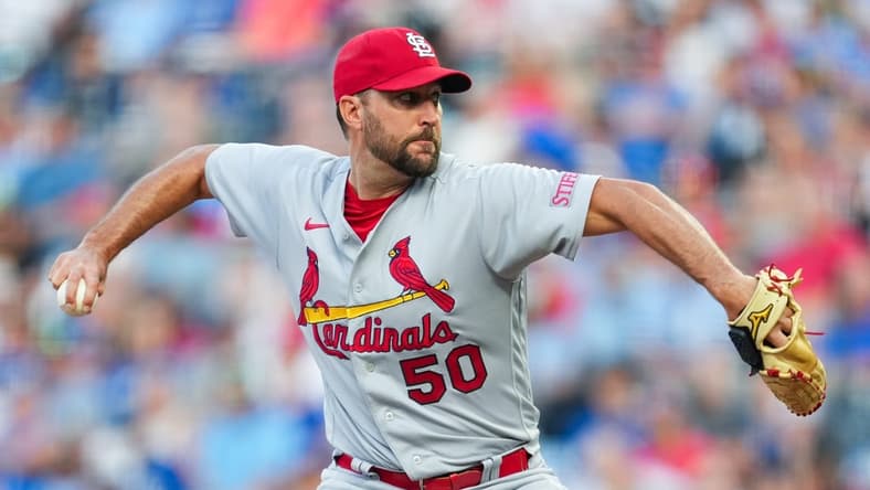 Aug 11, 2023; Kansas City, Missouri, USA; St. Louis Cardinals starting pitcher Adam Wainwright (50) pitches during the first inning against the Kansas City Royals at Kauffman Stadium. Mandatory Credit: Jay Biggerstaff-USA TODAY Sports