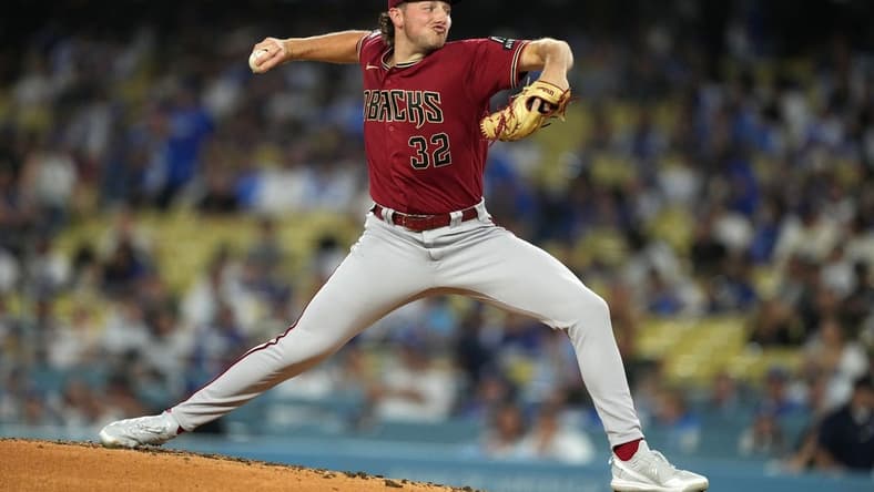Aug 29, 2023; Los Angeles, California, USA; Arizona Diamondbacks starting pitcher Brandon Pfaadt (32) throws in the second inning against the Los Angeles Dodgers at Dodger Stadium. Mandatory Credit: Kirby Lee-USA TODAY Sports