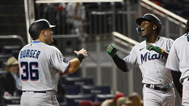 Aug 31, 2023; Washington, District of Columbia, USA; Miami Marlins center fielder Jazz Chisholm Jr. (2) celebrates with third baseman Jake Burger (36) after hitting a three run home run against the Washington Nationals during the fifth inning  at Nationals Park. Mandatory Credit: Brad Mills-USA TODAY Sports