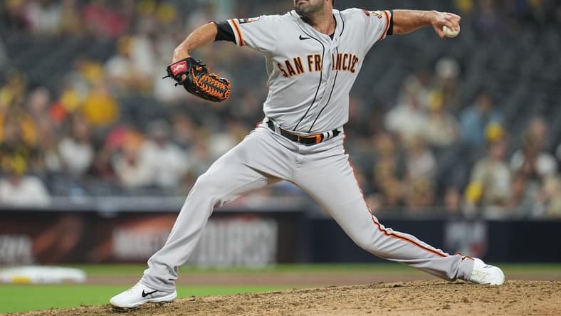 Aug 31, 2023; San Diego, California, USA;  San Francisco Giants relief pitcher Scott Alexander (54) throws a pitch against against the San Diego Padres during the ninth inning at Petco Park. Mandatory Credit: Ray Acevedo-USA TODAY Sports