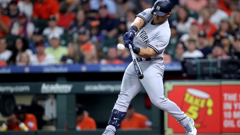 Sep 1, 2023; Houston, Texas, USA; New York Yankees center fielder Jasson Dominguez (89) hits a two-run home run home run to left field against the Houston Astros during the first inning at Minute Maid Park. Mandatory Credit: Erik Williams-USA TODAY Sports