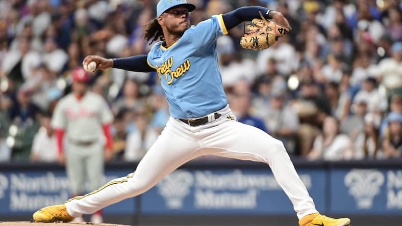 Sep 1, 2023; Milwaukee, Wisconsin, USA; Milwaukee Brewers pitcher Freddy Peralta (51) pitches against the Philadelphia Phillies in the first inning at American Family Field. Mandatory Credit: Benny Sieu-USA TODAY Sports