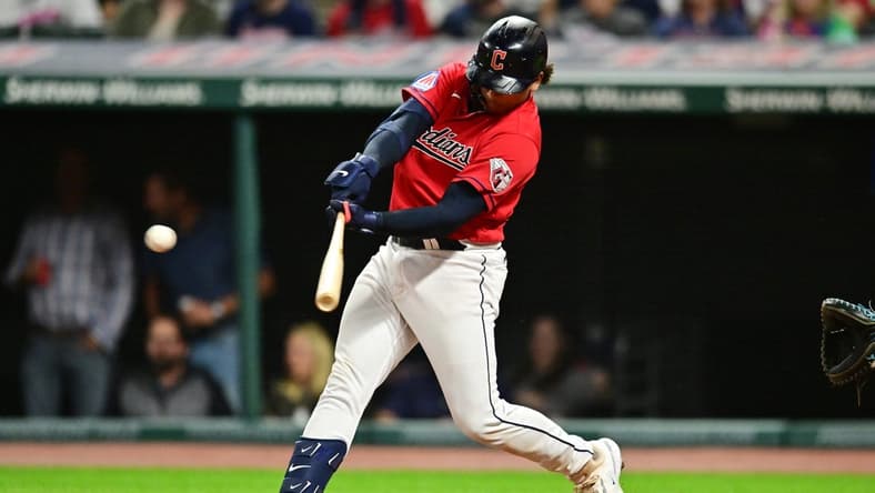Sep 1, 2023; Cleveland, Ohio, USA; Cleveland Guardians catcher Bo Naylor (23) hits an RBI double during the seventh inning against the Tampa Bay Rays at Progressive Field. Mandatory Credit: Ken Blaze-USA TODAY Sports