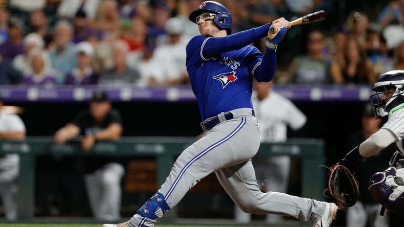 Sep 1, 2023; Denver, Colorado, USA; Toronto Blue Jays catcher Danny Jansen (9) watches his ball on a two run home run in the sixth inning against the Colorado Rockies at Coors Field. Mandatory Credit: Isaiah J. Downing-USA TODAY Sports