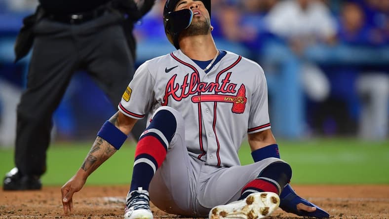September 1, 2023; Los Angeles, California, USA; Atlanta Braves left fielder Eddie Rosario (8) reacts after caught stealing home against the Los Angeles Dodgers during the second inning at Dodger Stadium. Mandatory Credit: Gary A. Vasquez-USA TODAY Sports