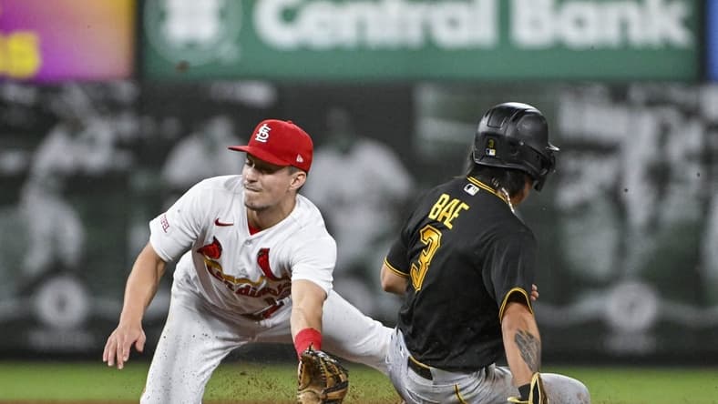 Sep 1, 2023; St. Louis, Missouri, USA;  Pittsburgh Pirates second baseman Ji Hwan Bae (3) steals second base as St. Louis Cardinals second baseman Tommy Edman (19) fields the throw during the tenth inning at Busch Stadium. Mandatory Credit: Jeff Curry-USA TODAY Sports