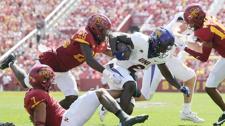 Iowa State Cyclones' defensive back Trevon Howard (25)takes down Northern Iowa Panthers running back Tye Edwards (2) during the first quarter in the season-opening game at Jack Trice Stadium on Saturday, Sept. 2, 2023, in Ames, Iowa.