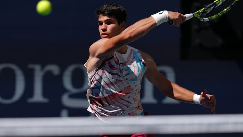 Sep 2, 2023; Flushing, NY, USA; Carlos Alcaraz of Spain hits to Daniel Evans of Great Britain on day six of the 2023 U.S. Open tennis tournament at USTA Billie Jean King National Tennis Center. Mandatory Credit: Danielle Parhizkaran-USA TODAY Sports