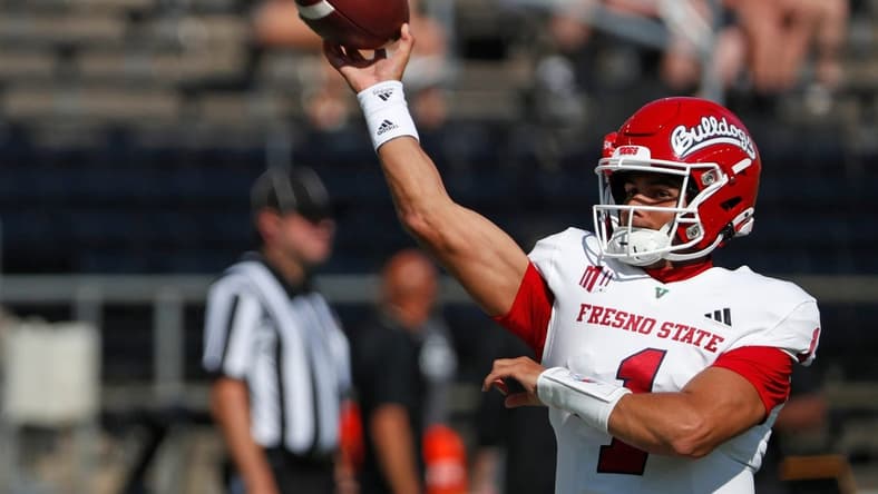 Fresno State Bulldogs quarterback Mikey Keene (1) throws the ball ahead of the NCAA football game against the Purdue Boilermakers, Saturday, Sept. 2, 2023, at Ross-Ade Stadium in West Lafayette, Ind. Fresno State Bulldogs won 39-35.