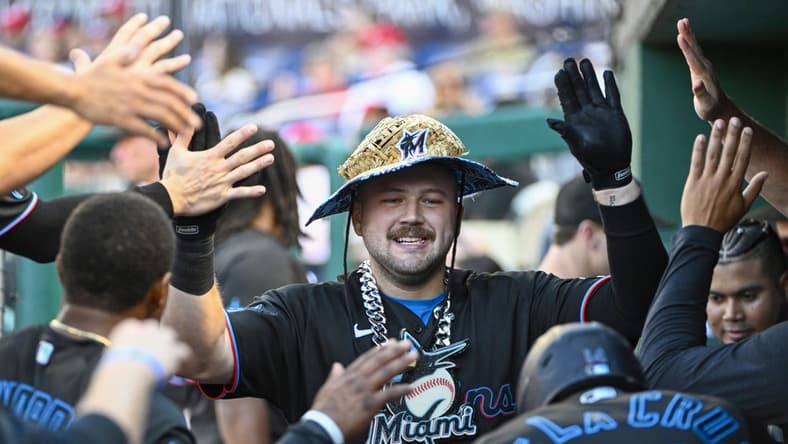 Sep 2, 2023; Washington, District of Columbia, USA; Miami Marlins third baseman Jake Burger (36) is congratulated by teammates after hitting a solo home run against the Washington Nationals during the third inning at Nationals Park. Mandatory Credit: Brad Mills-USA TODAY Sports