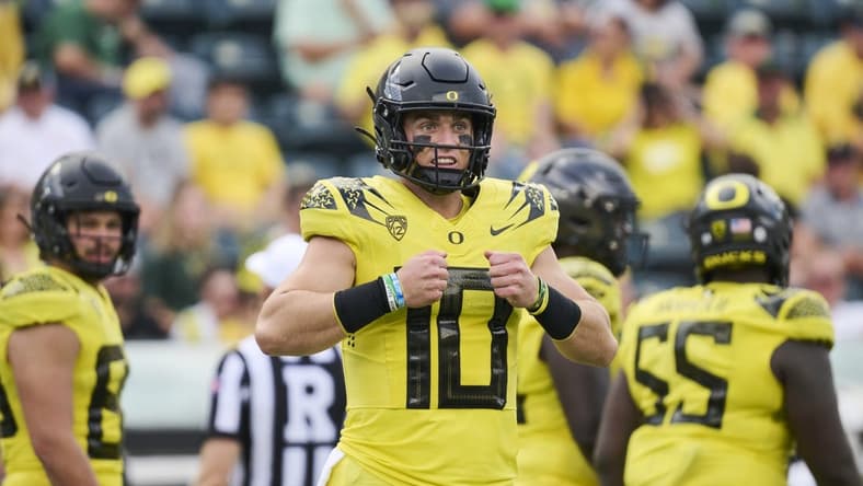 Sep 2, 2023; Eugene, Oregon, USA; Oregon Ducks quarterback Bo Nix (10) signals to the sideline during the second half against the Portland State Vikings at Autzen Stadium. Mandatory Credit: Troy Wayrynen-USA TODAY Sports