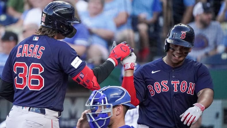 Sep 2, 2023; Kansas City, Missouri, USA; Boston Red Sox first baseman Triston Casas (36) celebrates with third baseman Rafael Devers (11) after hitting a two run home run against the Kansas City Royals in the first inning at Kauffman Stadium. Mandatory Credit: Denny Medley-USA TODAY Sports