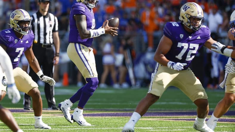 Sep 2, 2023; Seattle, Washington, USA; Washington Huskies quarterback Michael Penix Jr. (9) looks to pass against the Boise State Broncos during the fourth quarter at Alaska Airlines Field at Husky Stadium. Mandatory Credit: Joe Nicholson-USA TODAY Sports