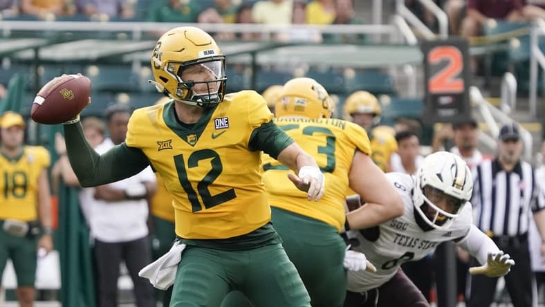 Sep 2, 2023; Waco, Texas, USA; Baylor Bears quarterback Blake Shapen (12) throws downfield against the Texas State Bobcats during the first half at McLane Stadium. Mandatory Credit: Raymond Carlin III-USA TODAY Sports