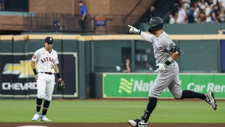 Sep 2, 2023; Houston, Texas, USA; New York Yankees right fielder Aaron Judge (99) rounds the bases after hitting a home run against Houston Astros starting pitcher Hunter Brown (58)(not pictured) in the third inning at Minute Maid Park. Mandatory Credit: Thomas Shea-USA TODAY Sports