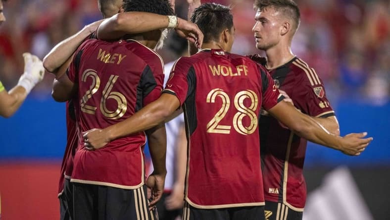 Sep 2, 2023; Frisco, Texas, USA; Atlanta United forward Giorgos Giakoumakis (7) and midfielder Saba Lobjanidze (9) and defender Caleb Wiley (26) and forward Tyler Wolff (28) celebrate after Giakoumakis scores a goal against FC Dallas during the first half at Toyota Stadium. Mandatory Credit: Jerome Miron-USA TODAY Sports