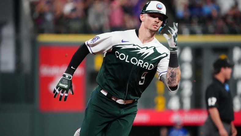 Sep 2, 2023; Denver, Colorado, USA; Colorado Rockies center fielder Brenton Doyle (9) runs the bases after hitting a three run triple against the Toronto Blue Jays in the fifth inning at Coors Field. Mandatory Credit: Ron Chenoy-USA TODAY Sports
