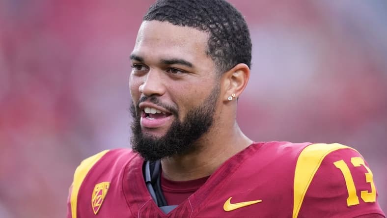 Sep 2, 2023; Los Angeles, California, USA; Southern California Trojans quarterback Caleb Williams (13) reacts against the Nevada Wolf Pack in the second half at United Airlines Field at Los Angeles Memorial Coliseum. Mandatory Credit: Kirby Lee-USA TODAY Sports