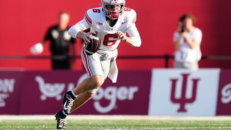 Sep 2, 2023; Bloomington, Indiana, USA; Ohio State Buckeyes quarterback Kyle McCord (6) scrambles during the NCAA football game at Indiana University Memorial Stadium. Ohio State won 23-3.