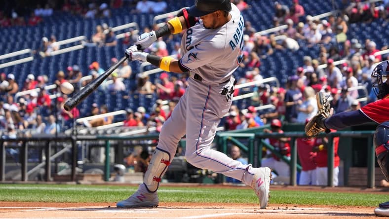 Sep 3, 2023; Washington, District of Columbia, USA;  Miami Marlins second baseman Luis Arraez (3) hits a home run against the Washington Nationals during the first inning at Nationals Park. Mandatory Credit: Gregory Fisher-USA TODAY Sports