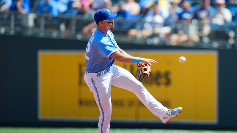 Sep 3, 2023; Kansas City, Missouri, USA; Kansas City Royals second baseman Nick Loftin (12) throws to first base during the second inning against the Boston Red Sox at Kauffman Stadium. Mandatory Credit: Jay Biggerstaff-USA TODAY Sports
