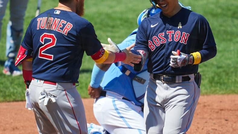Sep 3, 2023; Kansas City, Missouri, USA; Boston Red Sox left fielder Masataka Yoshida (7) celebrates with designated hitter Justin Turner (2) after hitting a home run against the Kansas City Royals during the fourth inning at Kauffman Stadium. Mandatory Credit: Jay Biggerstaff-USA TODAY Sports
