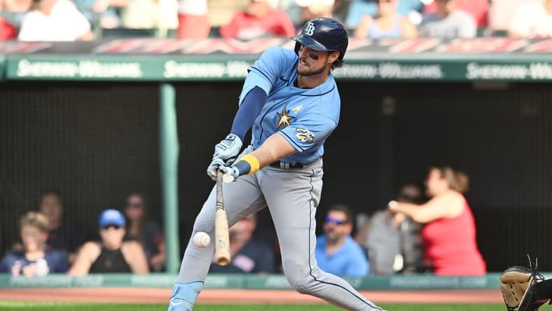 Sep 3, 2023; Cleveland, Ohio, USA; Tampa Bay Rays right fielder Josh Lowe (15) hits a single during the fourth inning against the Cleveland Guardians at Progressive Field. Mandatory Credit: Ken Blaze-USA TODAY Sports